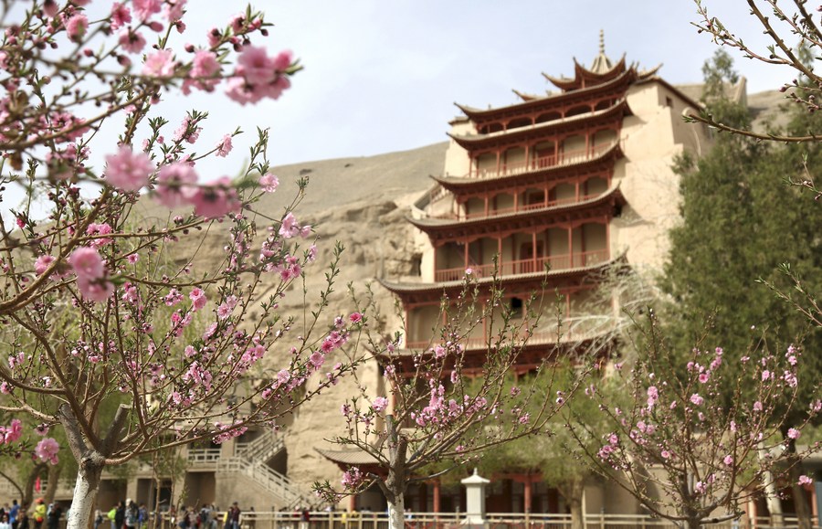 The Mogao Grottoes, a world cultural heritage site, in Dunhuang, northwest China. Photo by Xinhua/Zhang Xiaoliang.