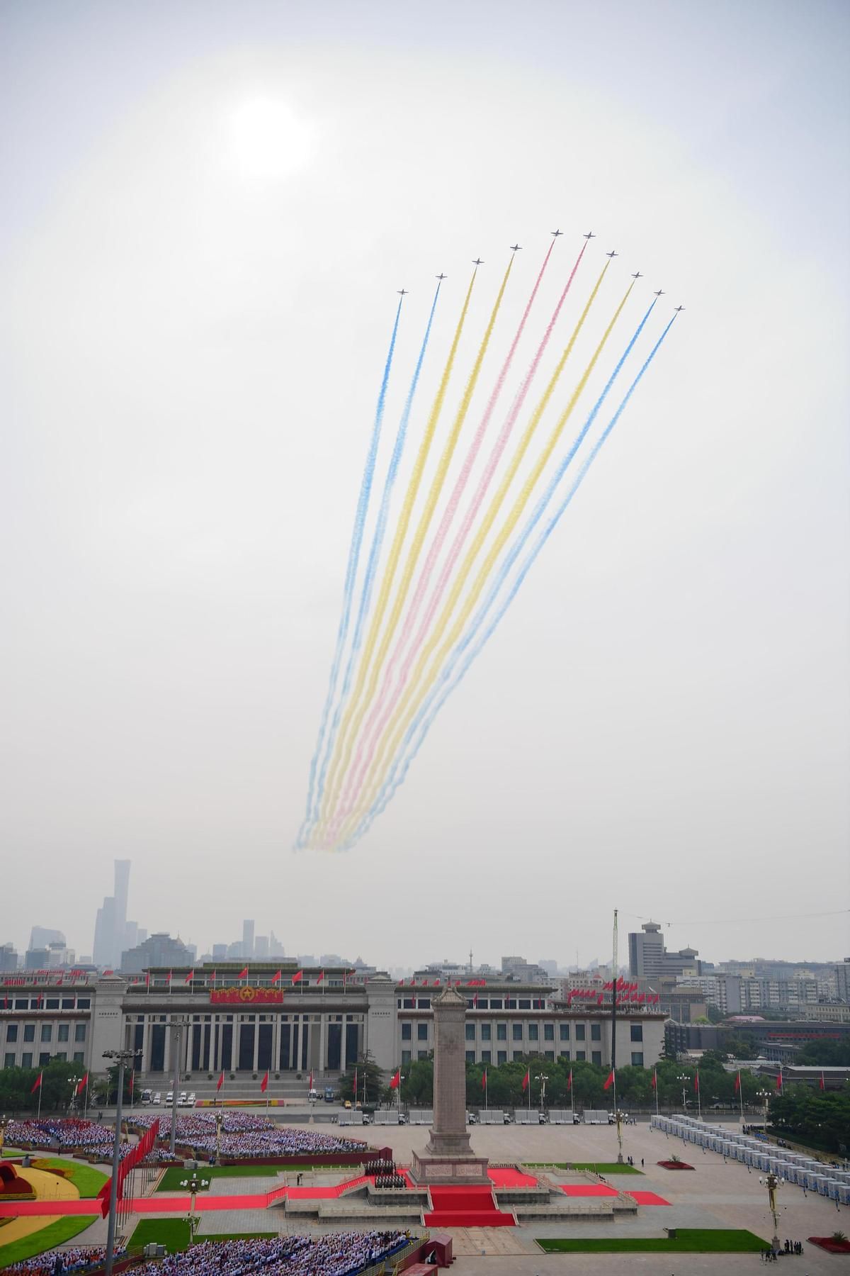 Military aircraft fly over Tian'anmen Square in echelon ahead of a grand gathering celebrating the centenary of the CPC in Beijing, July 1, 2021. Photo/Xinhua