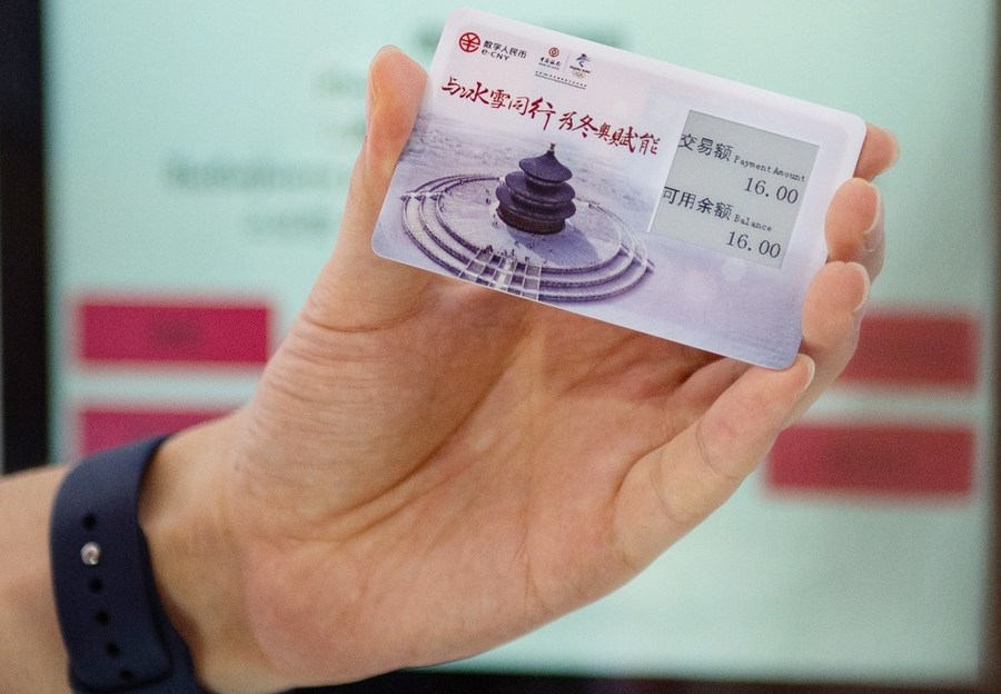 A visitor demonstrates e-CNY payment card during the 2021 China International Fair for Trade in Services (CIFTIS) in Beijing, capital of China. Photo by Xinhua/Chen Zhonghao.