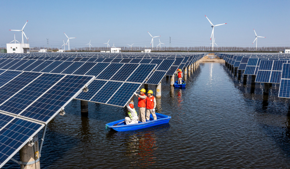 China's installed solar, wind power capacity surges. Photo by Xinhua.