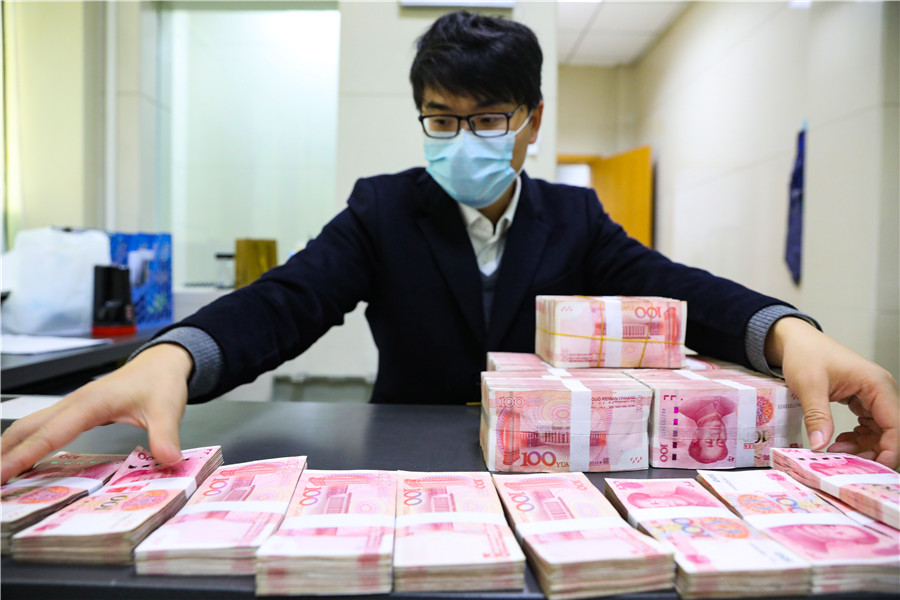 China's banking sector assets up. Photo by Xinhua.