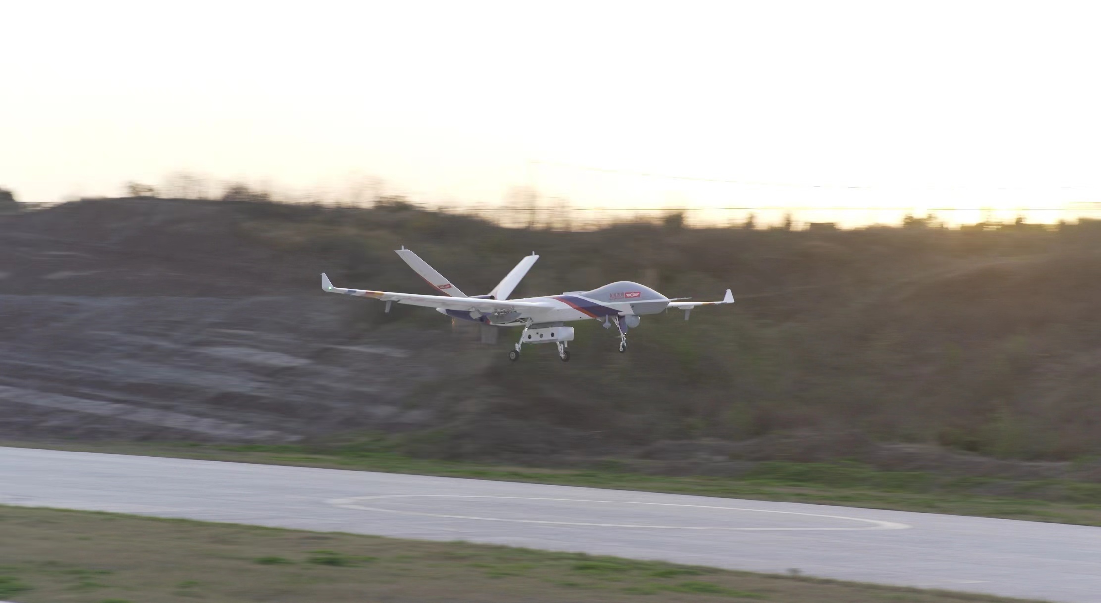 The Wing Loong-2 large unmanned aerial vehicle (UAV) takes off from an airport in the city of Zigong, southwest China's Sichuan Province. Photo by Aviation Industry Corporation of China/Xinhua.