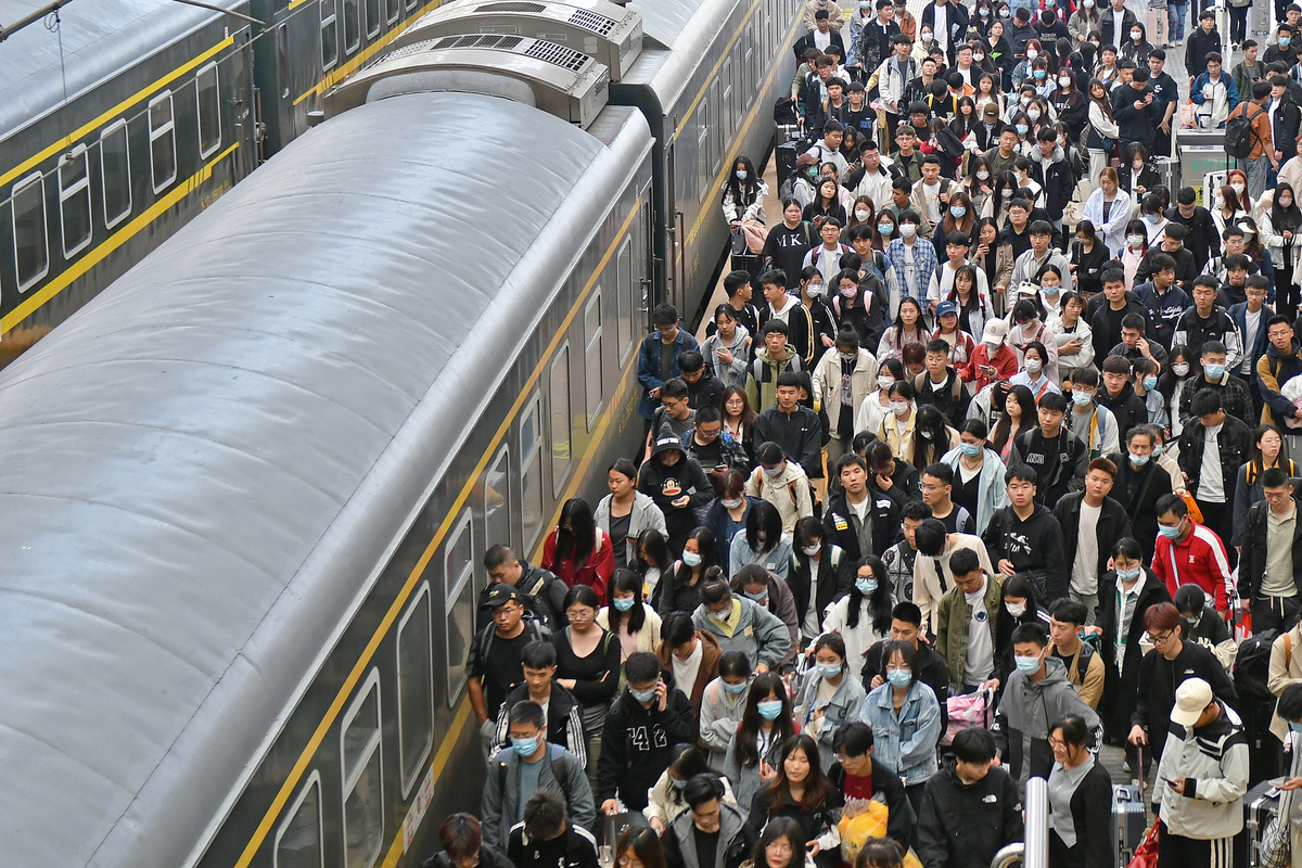 Railway passenger trips in China. Photo by Xinhua.