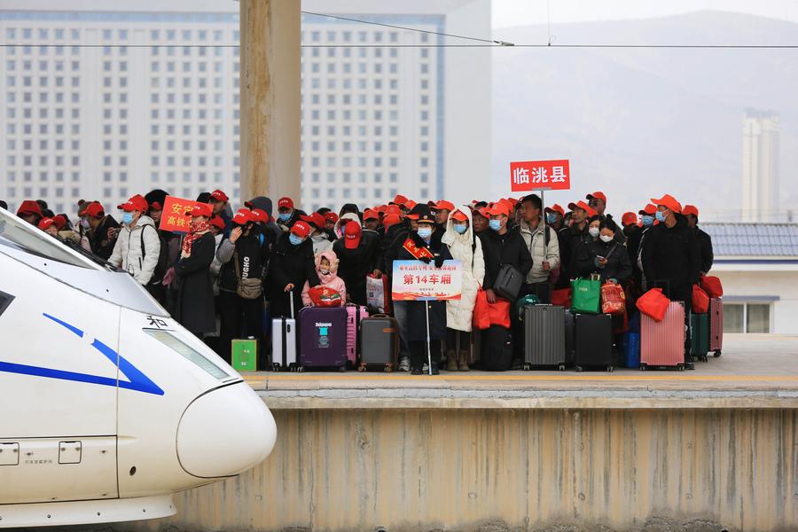 Chinese rural migrants. Photo by Xinhua.